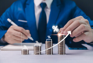 Businessman analyzing growth with coin stacks and percentage signs, conceptual financial success and investment. Planning long-term investments, buying DCA mutual funds, analyzing economic trends. - obrazy, fototapety, plakaty