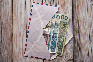 polskie banknoty w kopercie  - obrazy, fototapety, plakaty