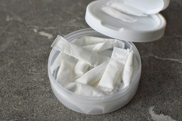 A box of snus pads is a substitute for smokeless cigarettes. Swedish nicotine pouche  close-up. 