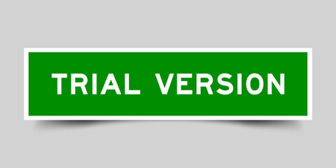 Square sticker label with word trial version in green color on gray background