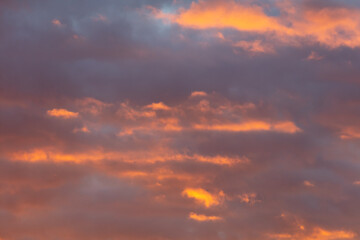 Naklejka na ściany i meble Colorful clouds at sunrise. Background