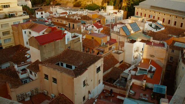 Establishing shot of Malaga, Andalucia, Spain, capturing the sprawling residential district, including the famous Alcazaba of Malaga