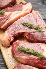 Pieces of raw beef meat on table, closeup