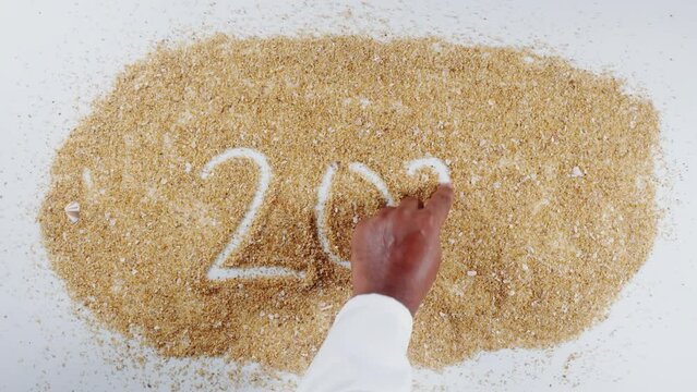 Hand Writes On Sand 2024