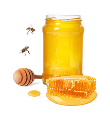 Natural honey in jar, wooden dipper, piece of honeycomb and bees on white background