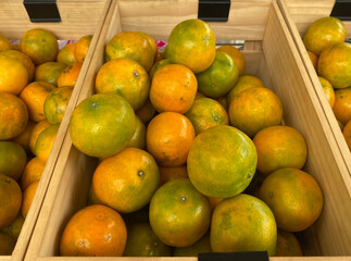 tangerine orange in the wood box.