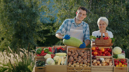 Farmers' Market Moments: Grandson and Grandma at the Counter of their Family Business.