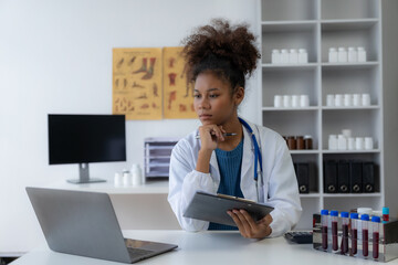 Researcher's hand holding blood vessel for examination in research lab Medical science laboratory,...