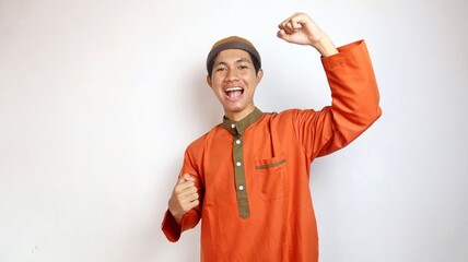 Asian Muslim man excited expression