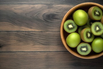 Short food supply chains SFSCs.From garden to plate concept.A bowl of fresh kiwis on the wood table.Flat lay,Copy space