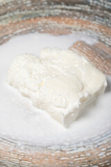 Buffalo cream. Dairy products. Fresh buffalo cream in a plate. Close up