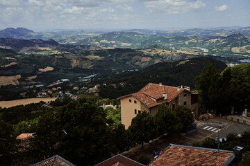 Fototapeta premium a breathtaking view from above of the houses and nature of San Marino