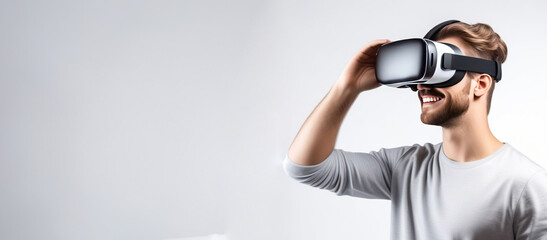 Banner with young smiling European man wearing virtual reality glasses. Vr headset.