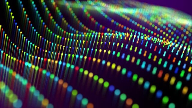 Multicolor wave flow animation of smoothly moving colorful particles on a dark background. Digital wallpaper with abstract field of rainbow colored dots and lines. Motion graphics , 4k video , 30 fps