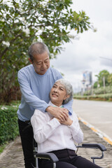 Couple in the park near home to relax, health and exercise in love sports, old man and senior woman taking a walk outdoors together in the morning