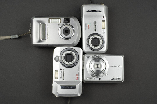 Prague, CZ- 13.12.2021: First generation compact digital cameras. Used Handy pocket photo Still camera. Editorial