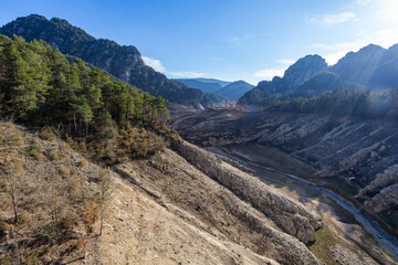 Lack water La Llosa Del Cavall Reservoir. The swamp is at very low water levels due to lack of rain. Desertification, climate change, environmental problems, drought. Lleida, Spain