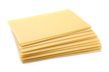 Stack of uncooked lasagna sheets isolated on white