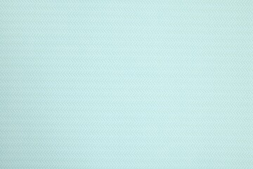 Stylish light turquoise wallpaper as background, closeup