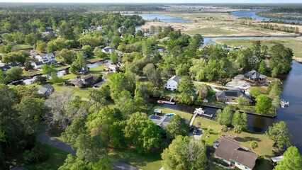 Living in neighborhood suburb in South Carolina low county by tidal marsh at Wedgefield Plantation...
