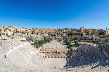 Roman theater in Amman, Jordan with city and citadel in the background