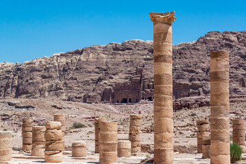 Columns with the Royals Tombs in the background in Petra, Jordan