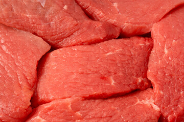 Veal pieces raw isolated on white background.