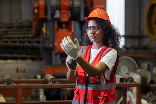 Factory engineer wear safety glove before work