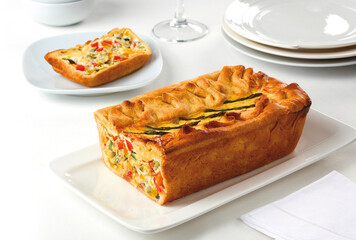 Vegetable pie with shortcrust pastry baked and cut