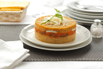 Quinoa cake with meat and egg filling