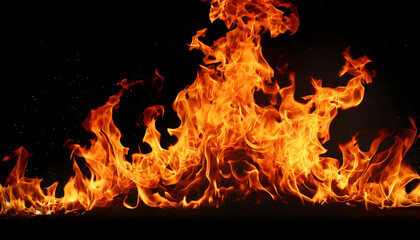 Obraz premium Glowing red and orange fire flames and sparks particles on black background, nature violent inferno