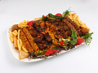 Arabic food dish food include chickens and meet with pottos   