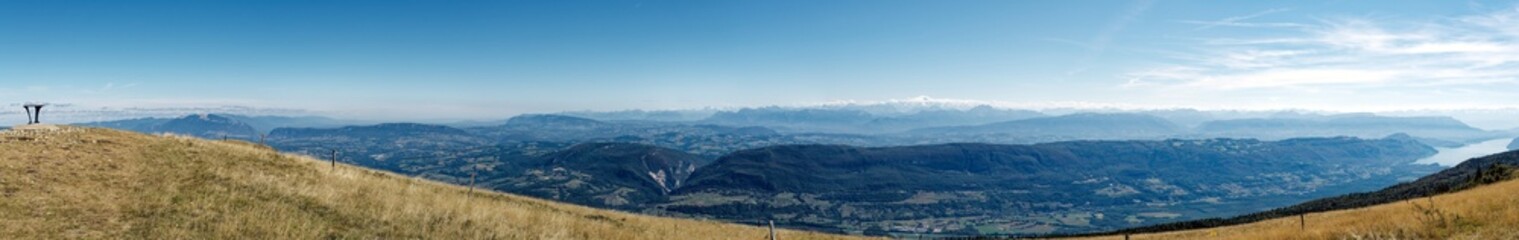 Panorama from Grand Colombier summit (France) on a clear summer day, looking eastward towards alps and Bourget lake