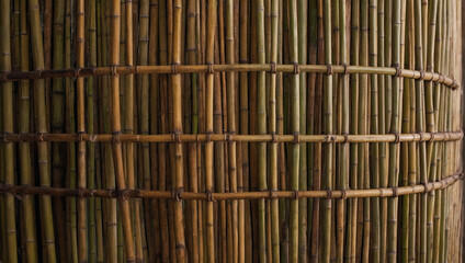 Bamboo surface texture with a repeating geometric pattern.