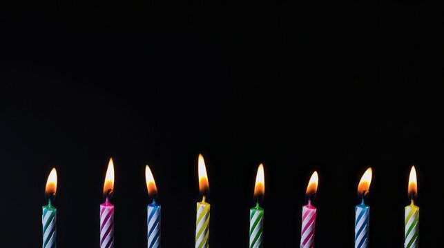Birthday candles in a row isolated with copy space background
