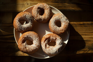 Donuts on table. Delicious food on table. Breakfast in morning.