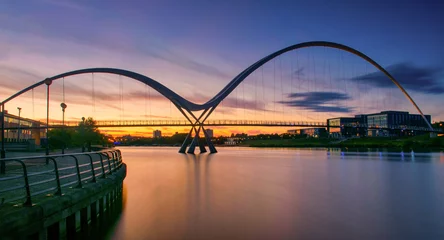 Photo sur Aluminium Europe du nord Infinity Bridge on dramatic sky at sunset in Stockton-on-Tees, UK.