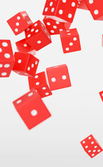 falling red casino dice on light grey background