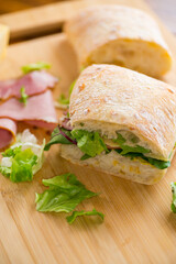 sandwich with sausage and herbs