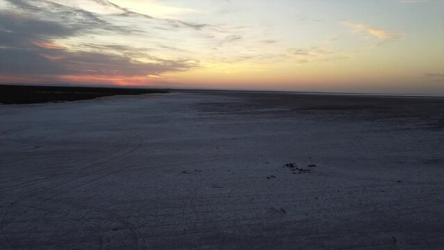 video a drone shot at sunrise over the large salt flats of cordoba / santiago del estero in argentina 3