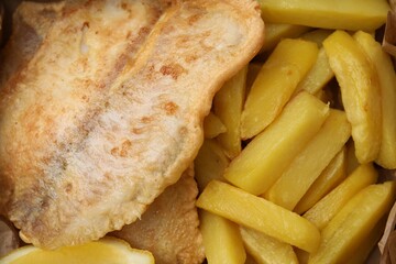 Delicious fish and chips as background, top view