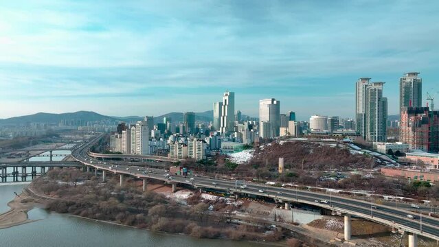Drone View of Seoul city in South Korea, Gangnam road 60fps, winter, sunrise