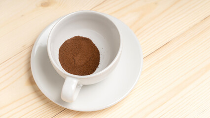 freeze-dried coffee, Instant coffee in white cup on wooden background, the view from top.