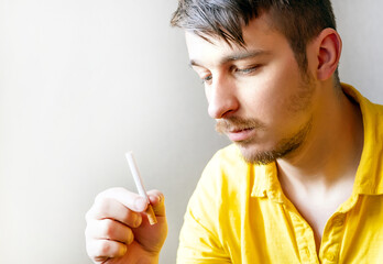 Pensive Young Man with a Cigarette