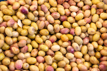 Background of green olives close up