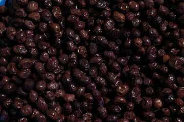 Background of black olives close up