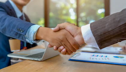 business people shaking hands on the deal