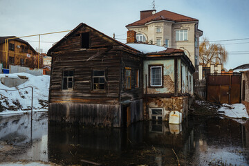 Fototapeta na wymiar Flooded rural house. Concept of disaster
