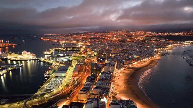 4k Aerial view of Las Palmas de Gran Canaria, the capital city of the Canary Islands. Spain. Playa de Las Canteras beach