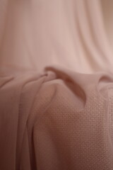 background of soft pink silk fabric